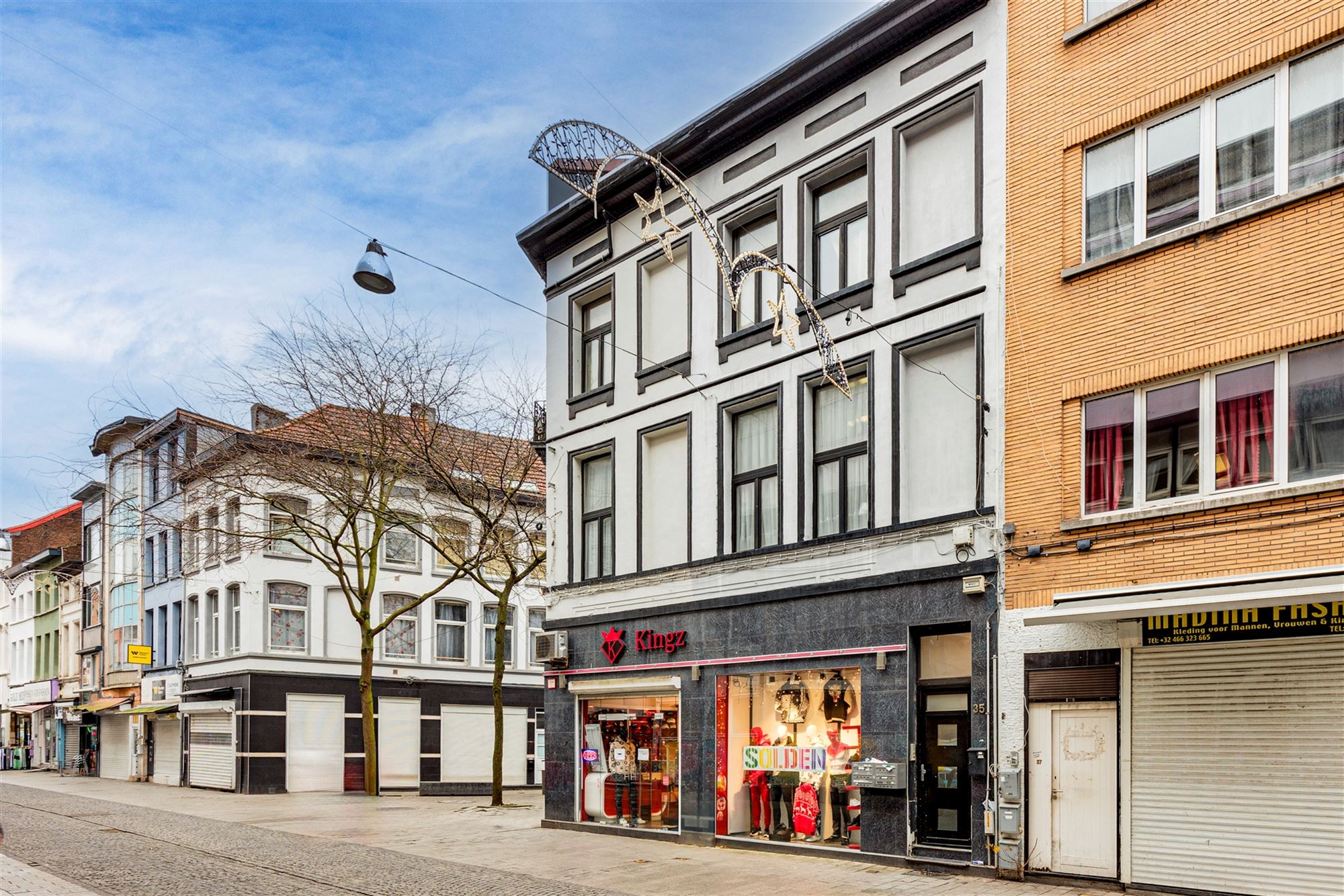 Hoekpand bestaande uit handelsglvl + 6 appartementen - foto 4