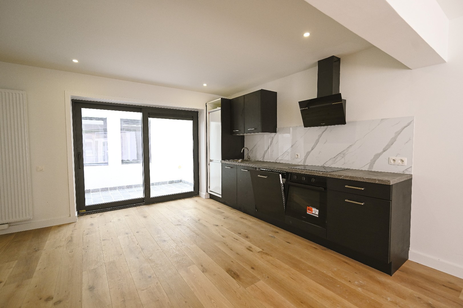 KNAP GELIJKVLOERS APPARTEMENT MET STADSTERRAS - foto 3