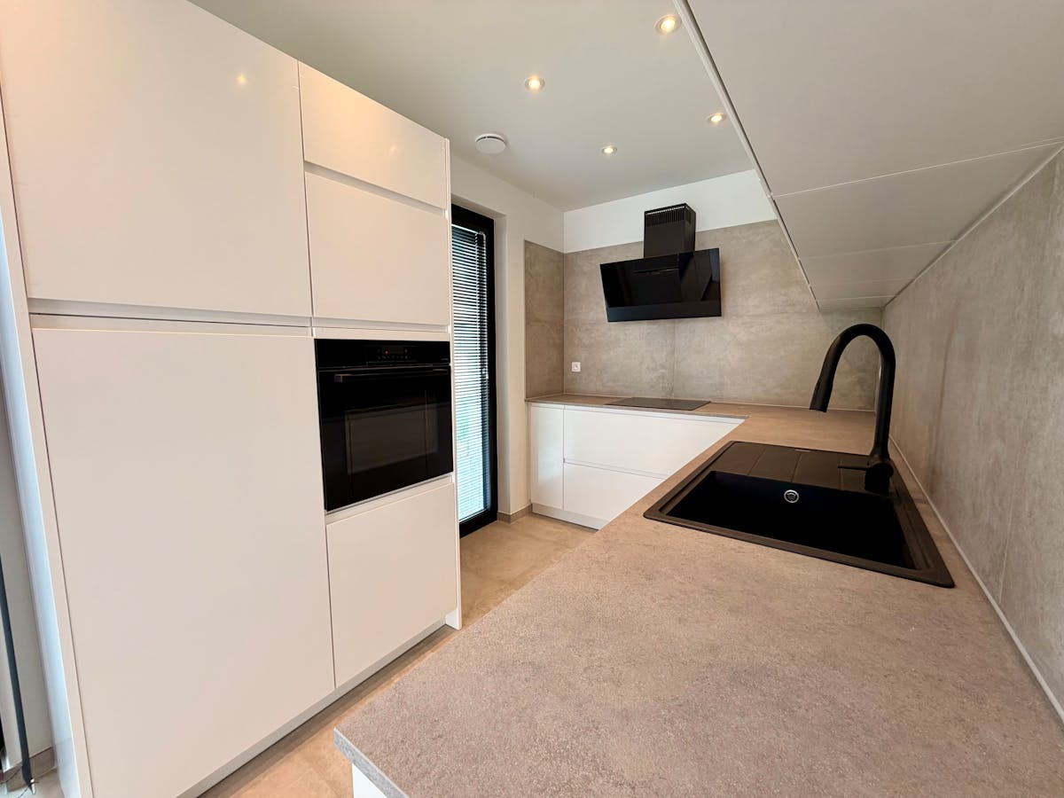 Appartement récemment construit au rez-de-chaussée à louer à Genk. - photo 5
