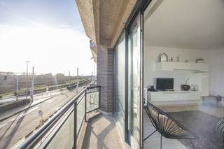  * Dit appartement bevindt zich op de 2de verdieping van residentie Escale II; * Ze bevat de volgende indeling: inkomhal met vestiairekast, apart...