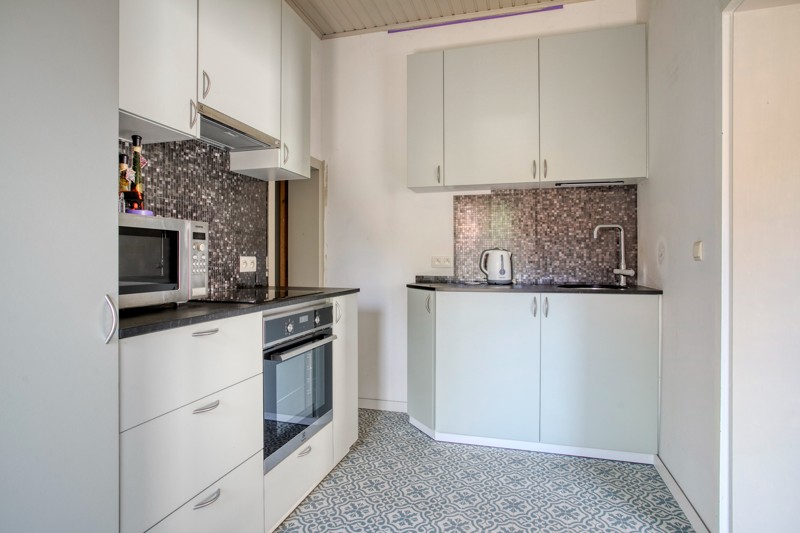 Gezellige woning met binnenkoer TE KOOP in het hart van Sint-Eloois-Vijve! - foto 4