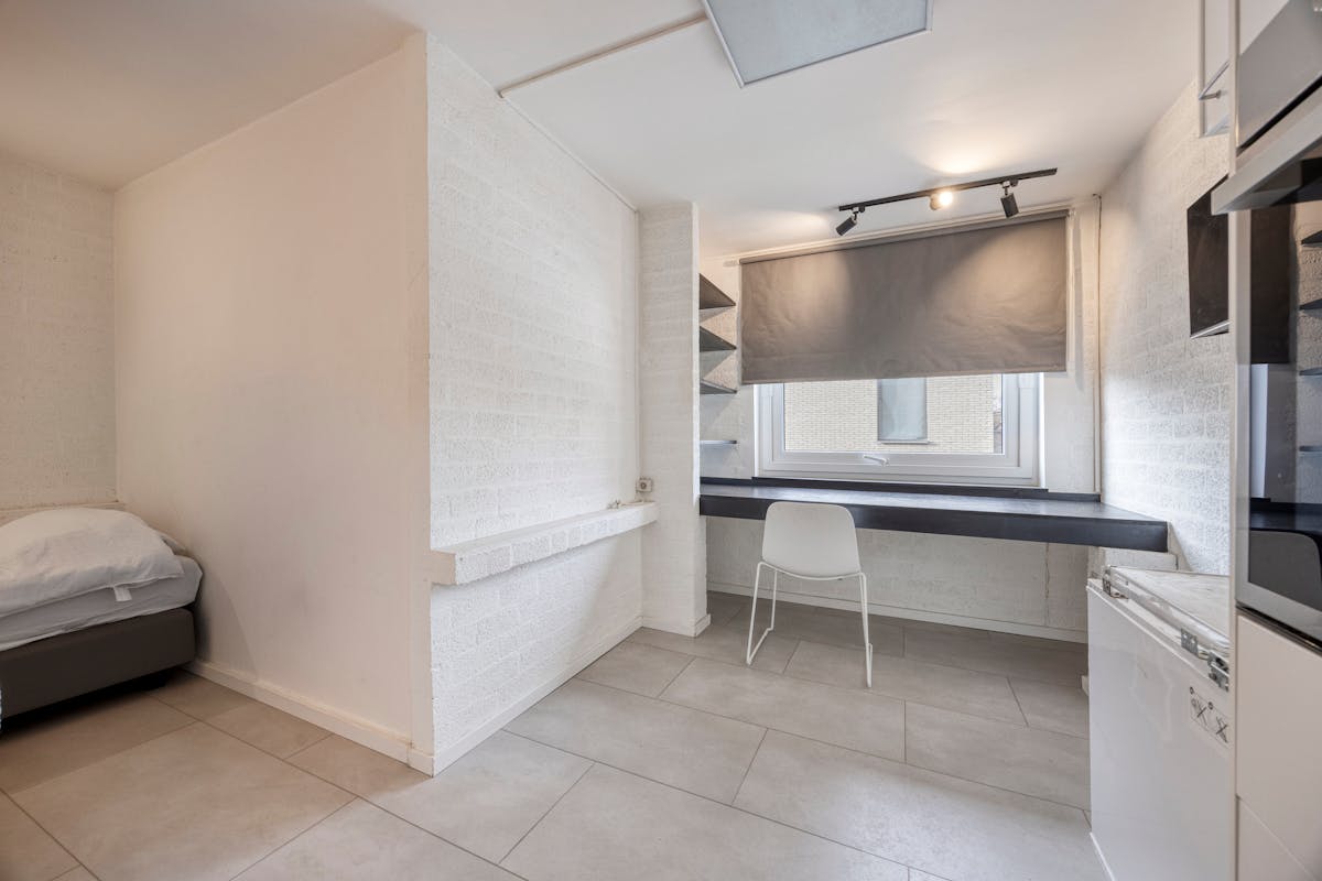 Opbrengsteigendom met 9 studentenkamers en duplex-appartement te Hasselt - foto 5