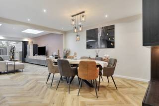 The house that we offer for sale in Stabroek is centrally located on the Grote Molenweg near all important facilities such as schools/shops, but with plenty of parking in front of the door - this makes it all ideal for families with children!Upon entering the house, you are welcomed by a spacious entrance hall, which leads to the living room. The bright living room has a dining and sitting area and is directly connected to the fully equipped open kitchen, all provided in the completely renovated extension. Through the living space, you have access to the beautifully landscaped garden, where you can enjoy peace and quiet and a built-in swimming pool. Furthermore, on the ground floor, there is a spacious garage with storage space, equipped with connections for washing machine and dryer, and a separate guest toilet. A separate passage to the garden is also provided. On the first floor, there are three large bedrooms and a bathroom. The second floor was fully finished and includes a fourth bedroom with built-in wardrobes. Last but not least, the garden with lots of privacy and a built-in swimming pool. The ideal setting for cosy summer nights! Details: - favorable EPC:... - indoor garage - very convenient location in Stabroek Interested? Contact our real estate office quickly! 03/666 66 66 or femke.van.helvert@dewaele.com - your Dewaele office in Kapellen at Hoevensebaan 25 - always free estimation and sales advice!EPC: 145 kWh/m²EPC: