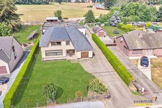 <p><span>This character home, which is in need of some updating, sits on 17 are of land and has a spacious living area of no less than 245 m².</span></p><p><span>The original owners, ', were builders', and that’s immediately apparent from the house. No corners were cut on materials, and the home was certainly built with plenty of space in mind.</span></p><p><span>On the ground floor, you enter a sumptuous, elegant foyer. <br />From here, you walk through double doors into a spacious living area, featuring solid hardwood floors and plenty of natural light.<br />There’s also a kitchen overlooking the garden, an office with access to the garden, an additional laundry room with a shower, and an in-house garage.</span></p><p><span>On the first floor, you’ll find 4 LARGE bedrooms and a bathroom that definitely needs some TLC.<br />Take a look at the master bedroom—it’s truly massive. There’s plenty of space here to incorporate a walk-in closet, for example.<br />Please note: the photo’s of the bedrooms have been edited. These rooms still need some paint and laminate flooring.</span></p><p><span><br />The attic room is also accessible from the first-floor hallway and is definitely suitable for creating an extra bedroom or playroom. </span></p><p><span>There is a dry basement, and at the back you’ll find a (permitted) workshop measuring no less than 300m². Ready for a new business venture or hobby.</span></p><p><span>There’s also an additional plot of land that can be purchased separately.</span></p><p><span> </span></p><p><span>Disclaimer: The photo's were edited using AI (white walls, laminate flooring on the first floor, greener grass,  ...) but nothing about the structure was altered. </span></p><p><span> </span></p><p><span> </span></p>