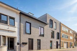 <p><span>Located in a very central yet quiet setting, near the village center, the Wijgmaal train station, and all major access roads, and bordering the tranquil Leuven-Dijle Canal with a perfect bike route to Leuven’s historic center, we are pleased to offer this recently built, energy-efficient duplex apartment for sale.</span></p><p><span> </span></p><p><span>This high-quality apartment is located in the well-maintained “ “” residence at De Kaai”, built in 2021. What makes this apartment unique is its homey atmosphere, abundant natural light, and spacious indoor and outdoor areas. With a total usable floor area of no less than 150 m², this first-floor duplex apartment features an entry hall with a guest restroom, a spacious living area with a dining area, and an open, fully equipped kitchen designed by the renowned Grietens Concept. The apartment also features a practical storage room, a convenient laundry room, and a staircase leading to the second floor. Here you’ll find a night hall, a separate toilet, a bathroom with both a bathtub and a shower, and three spacious bedrooms, one of which is equipped with built-in custom closets.</span></p><p><span> </span></p><p><span>As the icing on the cake, this contemporary duplex apartment features two sun-drenched, southeast-facing terraces totaling approximately 20 m², offering a stunning view of the Leuven-Dijle Canal—a delightful place to relax at any time. Another unmissable perk is the enclosed garage, which is available for purchase for 30,000 euros. In addition, residents also have access to a communal charging station and a communal bike storage area.</span></p><p><span> </span></p><p><span>In short, a move-in-ready, energy-efficient, spacious, and bright duplex apartment with a garage, located in a prime location near numerous essential amenities and with excellent access to downtown Leuven.</span></p><p><span> </span></p><p><span>An absolute steal!</span></p><p><span> </span></p>