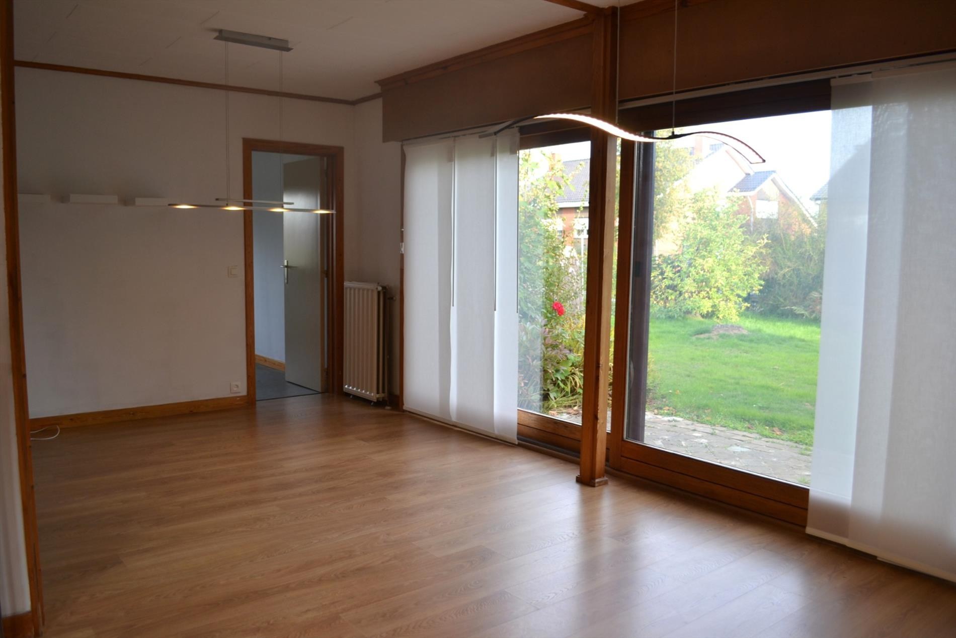 Rustig gelegen gelijkvloerse woning met tuin en garage - foto 4