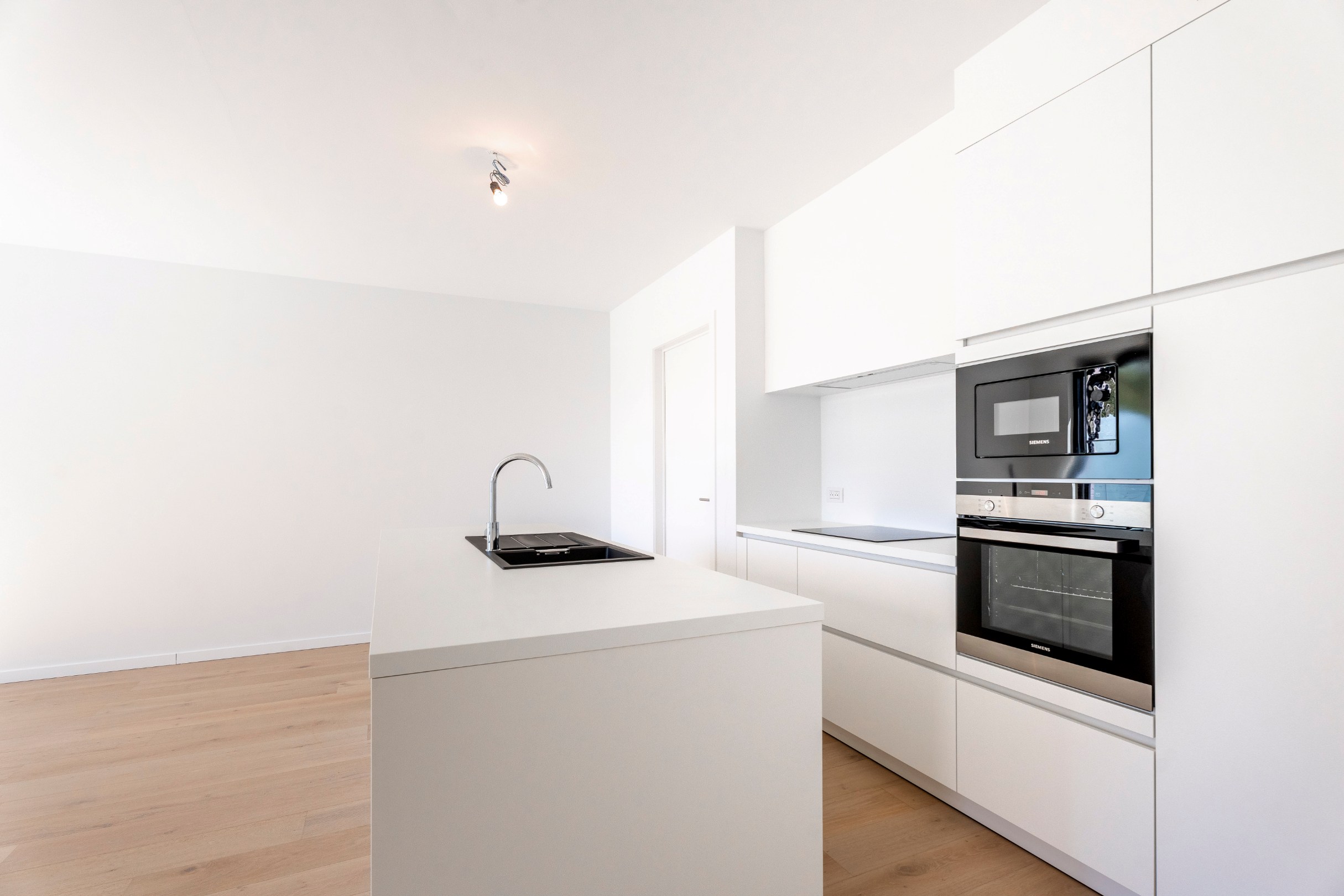 Luxueus nieuwbouwappartement met 3 slaapkamers, autostaanplaats, garage én kelderberging  in centrum Harelbeke. - foto 4