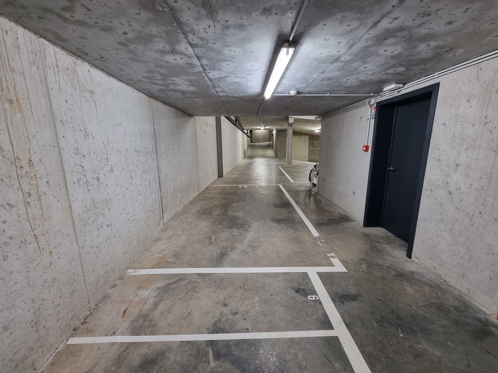 Ondergrondse autostaanplaats te centrum Wolvertem! - foto 5