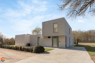 Op een unieke locatie in een groene omgeving te Bonheiden bevindt zich deze ruime nieuwbouwwoning op een schitterend perceel van 1500m². U...