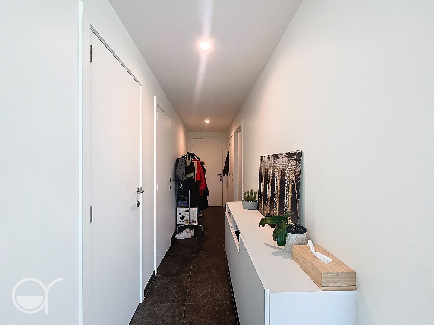 Gelijkvloers appartement met tuin en autostaanplaats - foto 2