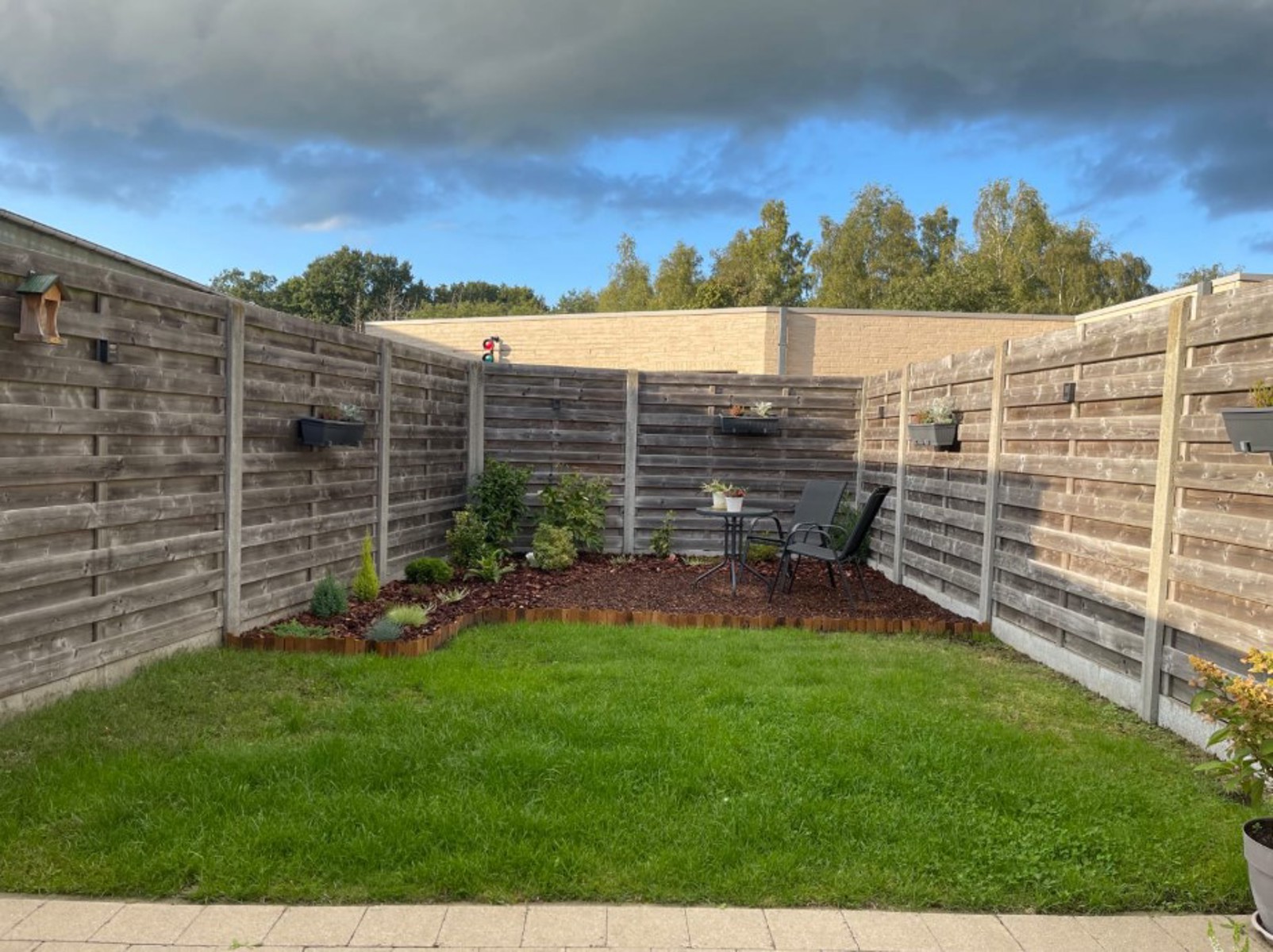 Gelijkvloers appartement met tuin en 2 autostaanplaatsen (1 ondergronds met berging en 1 bovengronds) - foto 2
