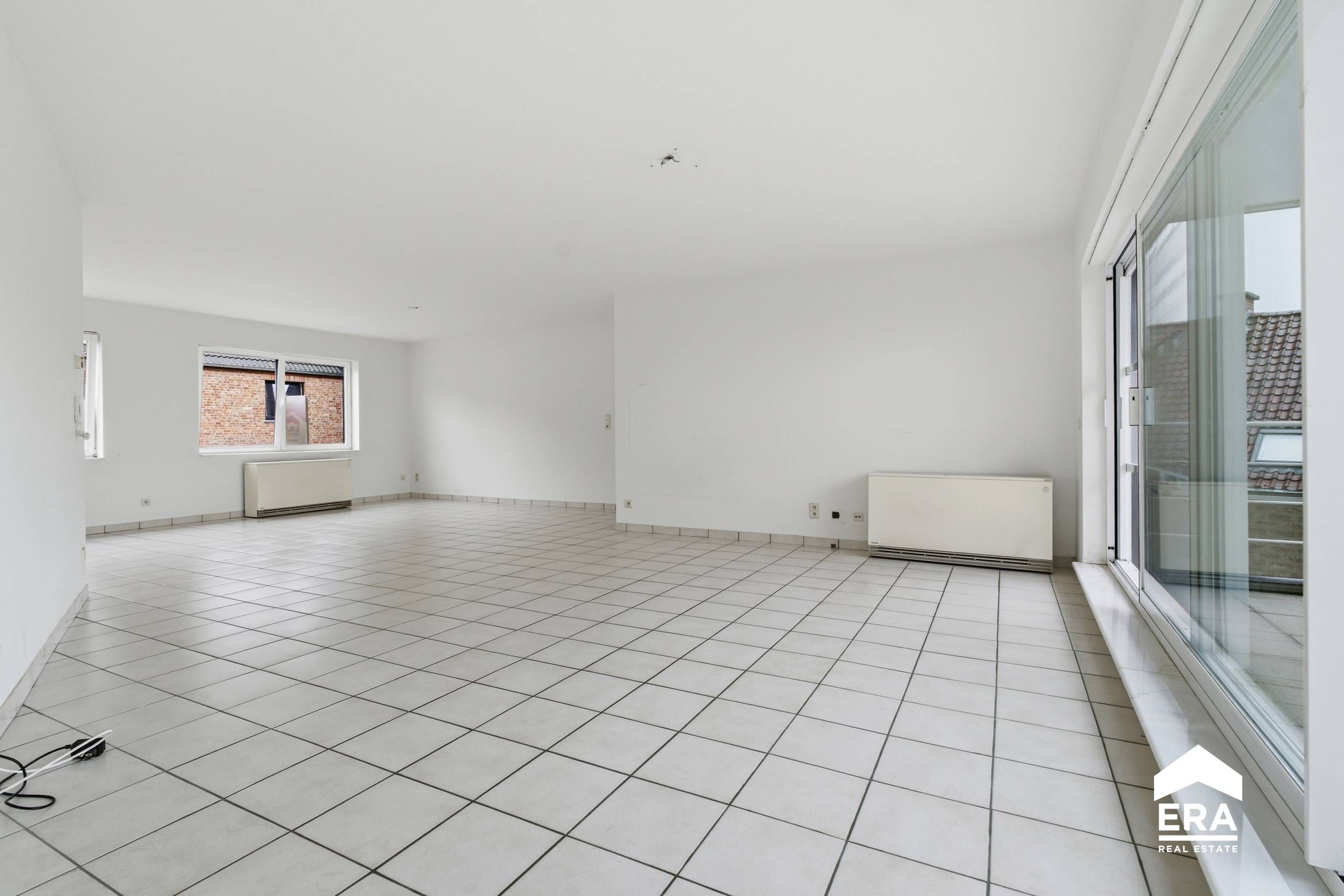 Ruim en lichtrijk appartement met terras en garage in Oekene - foto 5