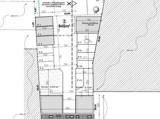 De afbeelding van de garages is een voorbeeld.