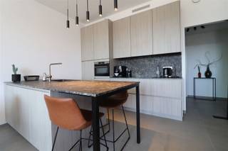 <p><span><span><span> this luxurious 1-bedroom apartment is located within walking distance of the MAS and its marina with a wide range of cozy restaurants and terraces. Furthermore, there is good accessibility to public transport and located near major approach and exit roads. <br /><br />- Top location <br />- Car parking space (optional) <br />- Modern furnished apartment <br />- Terrace <br /><br />The apartment is located on the third floor. You enter the apartment through the entrance hall with separate toilet with hand-washer, storage room and access to the living space. In the living space we find an open kitchen equipped with all necessary appliances. Through the living room you have access to the spacious bedroom with connecting bathroom with sink, toilet and shower. <br />Furthermore, the apartment also has a terrace where you can enjoy the sun throughout the day. <br /><br />Finally, there is a car parking space that can optionally be rented and a bicycle storage room in the basement of the building. <br /><br />Common costs: <br />Car parking space: <br /><br />Are you curious about this nice apartment? Please submit the rental application on our website: www.sinjoor.be and one of our colleagues will call you soon</span></span></span></p>