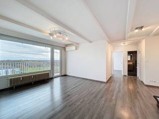 VILVORDE - 3 FONTAINES - Appartement met 2 slaapkamers en terras op de 9e verdieping. Het bestaat uit een grote woon-/eetkamer, een ingerichte...