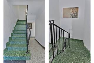 Opbrengsteigendom bestaande uit 2 gerenoveerde appartementen (2021) met twee slaapkamers en terras, staanplaatsen en garage, en een...