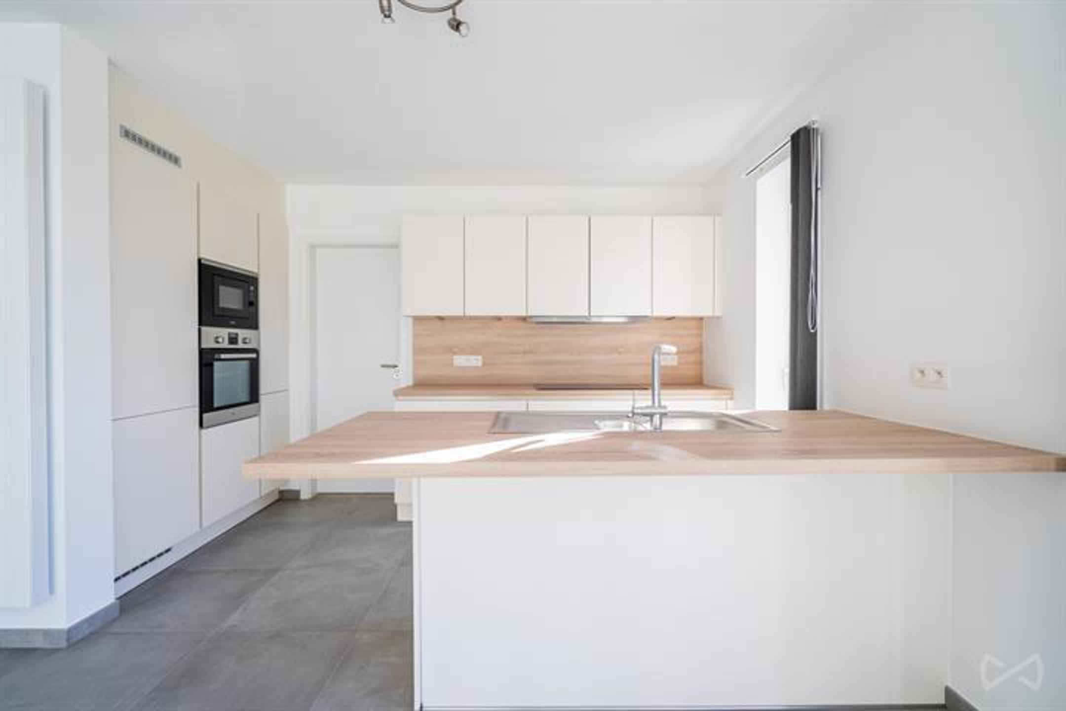 Appartement te huur in Hannut met 2 slaapkamers - foto 4