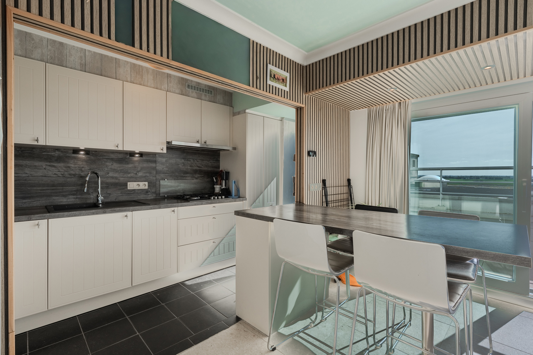 Lichtrijk éénslaapkamerappartement met zonneterras en zijdelings zeezicht in Westende - foto 5