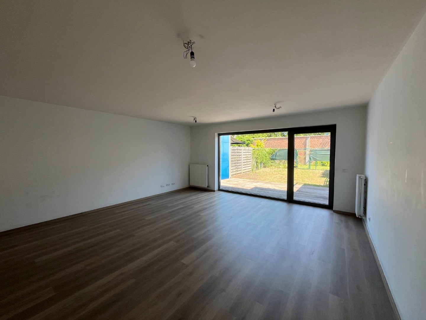 Centrumwoning met tuin, terras én ondergrondse parkeerplaats. - foto 4