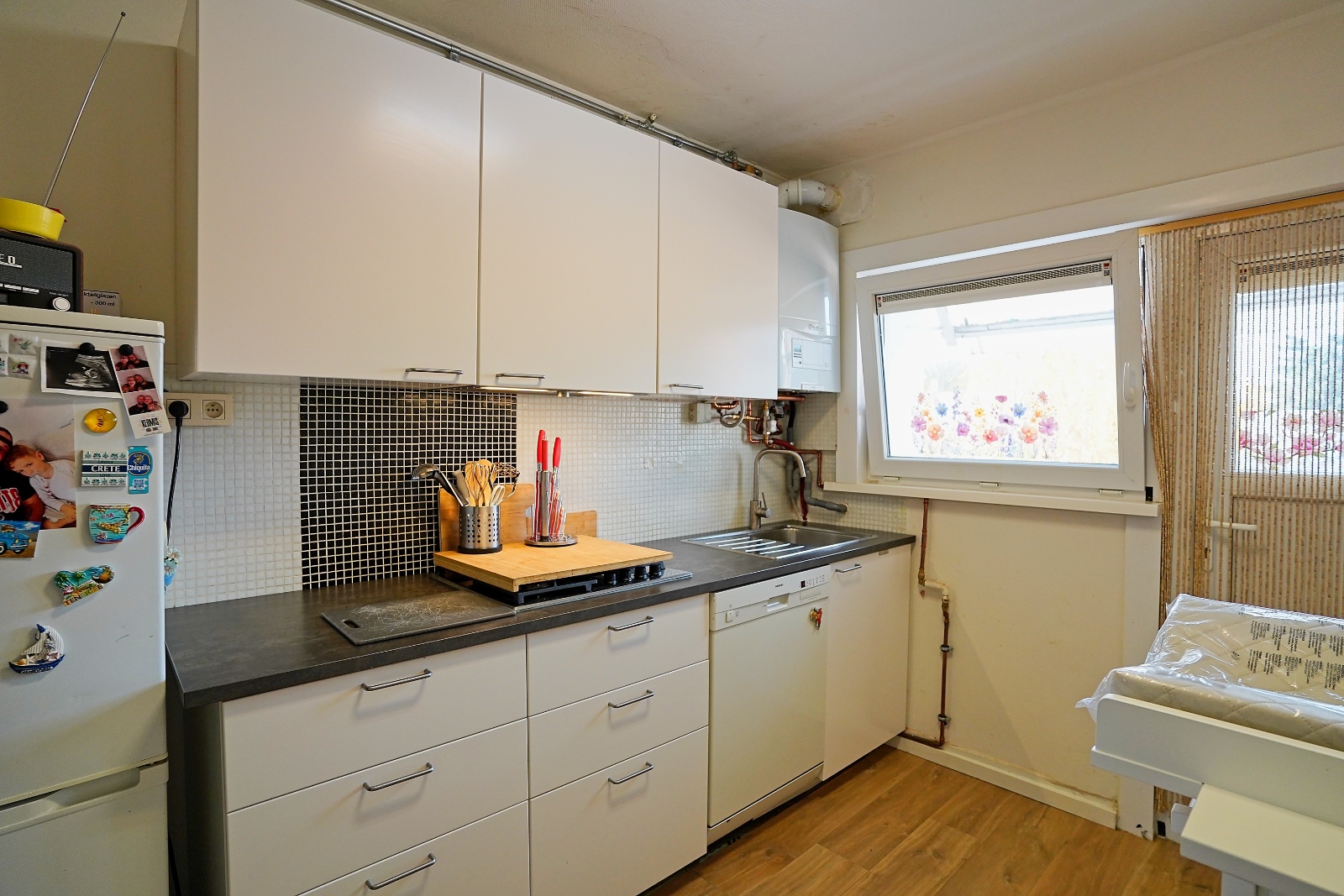 Gezellig en lichtrijk appartement te koop in het hart van Merksem - photo 4