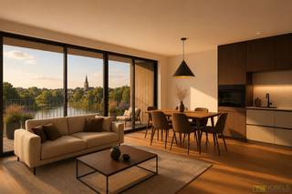 <span><u>Dit project komt in aanmerking voor het verlaagde btw-tarief van 6% (onder voorwaarden).</u></span><br /><br /><strong>LUXUEUS EN ENERGIEZUINIG NIEUWBOUWAPPARTEMENT</strong> met <strong>DRIE SLAAPKAMERS</strong>, <strong>TWEE BADKAMERS</strong> en een <strong>ROYAAL ZONNETERRAS</strong> aan de <strong>OEVERS VAN DE DENDER</strong> in Geraardsbergen. Deze eigentijdse wooneenheid combineert modern comfort met duurzame technieken zoals <strong>VLOERVERWARMING EN EEN WARMTEPOMP</strong>, wat resulteert in een aangenaam binnenklimaat en <strong>LAGE ENERGIEKOSTEN</strong>. De lichtrijke leefruimte geeft uit op een <strong>ZUIDGERICHT TERRAS MET OPEN ZICHT OP HET WATER</strong>. Dankzij de doordachte indeling geniet je van optimale privacy, met onder meer een <strong>MASTER BEDROOM MET EN-SUITE BADKAMER</strong>. Het appartement bevindt zich op wandelafstand van winkels, scholen, horeca en openbaar vervoer, wat een ideale balans creëert tussen <strong>RUST EN STADSLEVEN</strong>. Bovendien kan je het <strong>INTERIEUR VOLLEDIG AFWERKEN NAAR EIGEN SMAAK</strong>, en is er de mogelijkheid tot <strong>AANKOOP VAN EEN GARAGE OF OVERDEKTE STAANPLAATS</strong>.<br /><br />Adres: Zakkaai 3