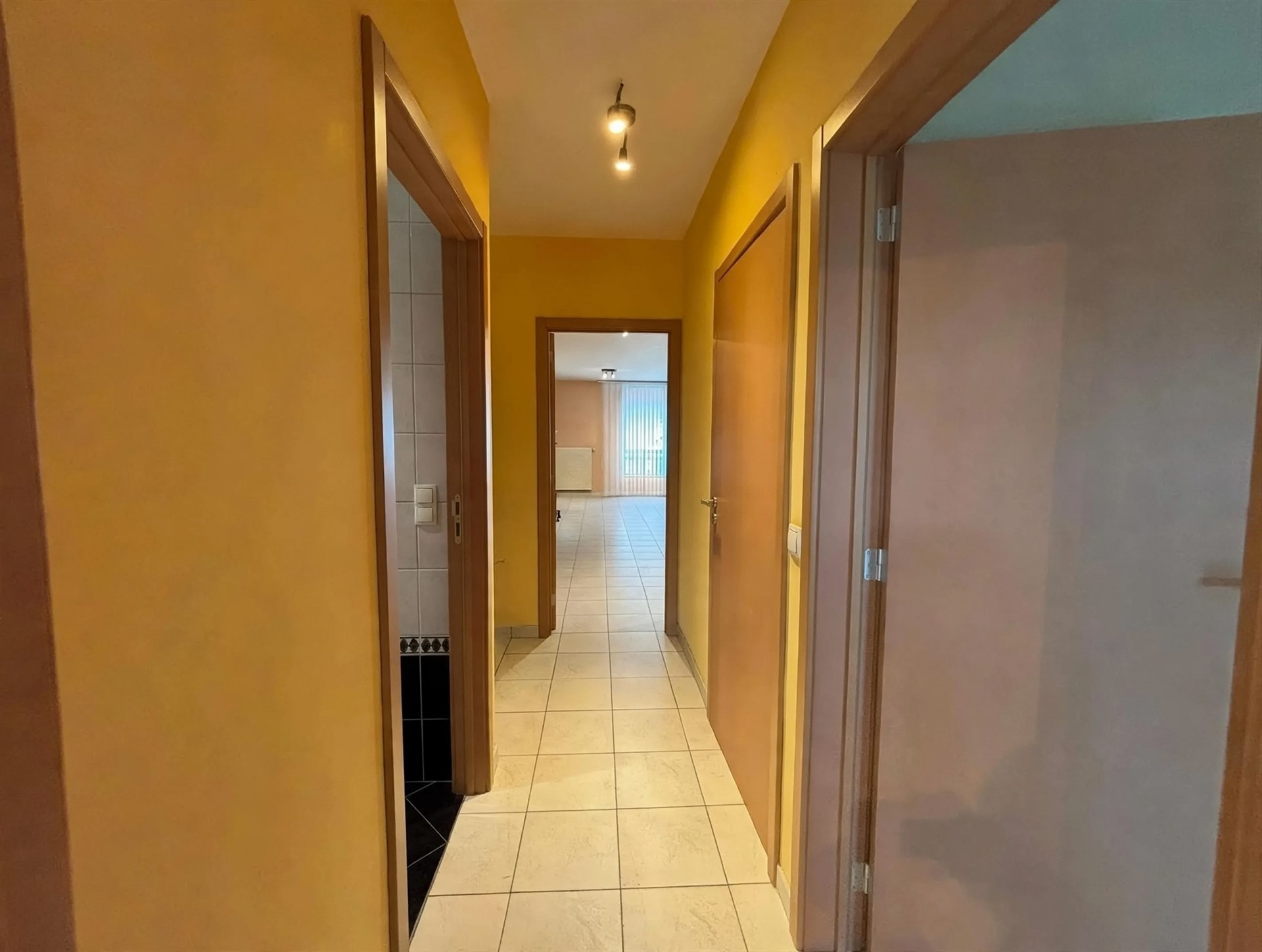 Gelijkvloers appartement met stadstuin en garage nabij het centrum van Aalst - foto 5