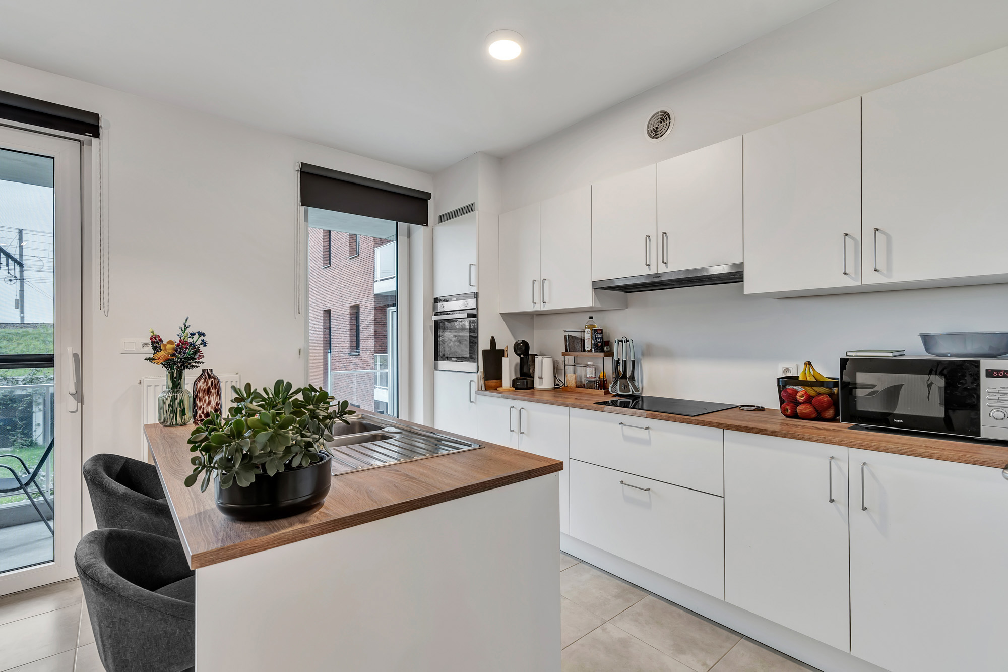 Energiezuinig tweeslaapkamer appartement met autostaanplaats - foto 3