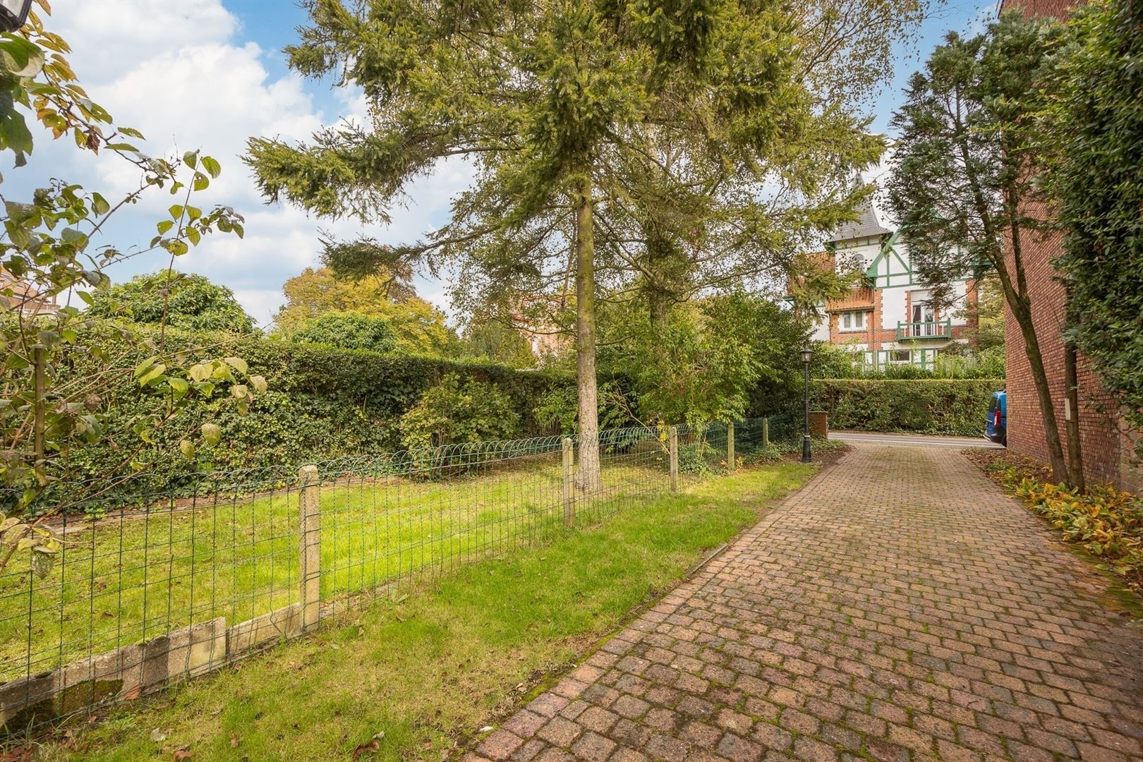 Halfopen bouwgrond in een rustige straat - foto 3