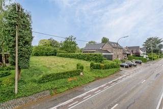 Perceel grond van 12a 40ca geschikt voor het realiseren van een open bebouwing met volgende eigenschappen:` bouwdiepte op het gelijkvloers maximaal...