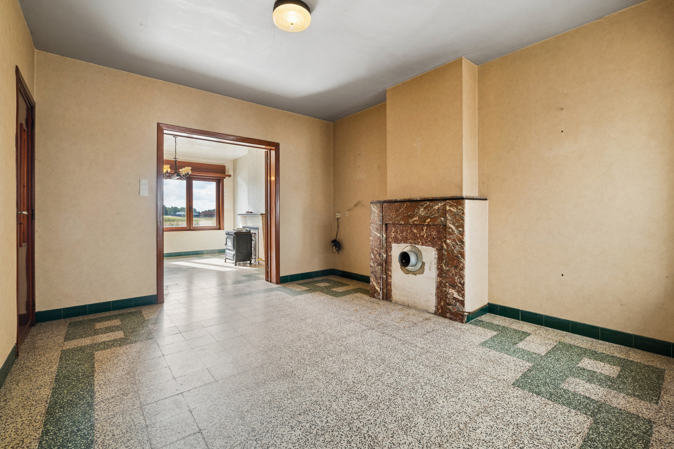 Te renoveren woning met tuin op centrale ligging - foto 5