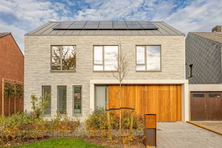 Ontdek deze prachtige energiezuinige woning die comfort en stijl perfect combineert!Met een bewoonbare oppervlakte van 221 m² en een perceel van 489...