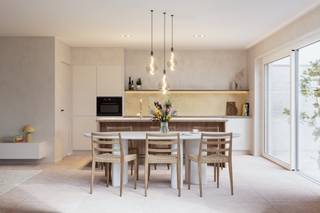 Deze energieneutrale (E-peil = -1) nieuwbouwwoning op een zuidgericht perceel van 226 m² is gelegen in een nieuwe straat zonder doorgaand verkeer. De halfopen bebouwing op lot 13 beschikt over een ruime woonkamer met ingerichte eilandkeuken en zicht op de omheinde tuin. Op de bovenverdieping zijn 3 volwaardige slaapkamers met ruime badkamer met bad én douche, apart toilet en berging. Omheining, terras, alle vloeren en een eigen aangelegde parkeerplaats zijn voorzien in de prijs.<br />Achteraan de woning voorzien we een poortje voor een uitweg handig voor fietsen enz.<br /><br />De interieurafwerking van je huis gebeurt volledig volgens je persoonlijke wensen. Reken hiervoor op begeleiding en expertise van ons interieurteam en partners. Bespaar fors op je energiefactuur, dankzij het doorgedreven isolatiepakket, warmtepomp met vloerverwarming ( + vloerkoeling) , ventilatiesysteem D en uitgebreid pakket zonnepanelen. Samen met de regenwaterput van 10.000L voldoet deze woning dus aan alle normen voor de toekomst! <br /><br />De prijs is excl. btw en kosten. Bij Durabrik ben je zeker van een vaste prijs.<br />Download de brochure op https://durabrik.immo/sint-niklaas<br /><br />Heb je vragen? Contacteer ons dan via 09/280 60 60 of via info@durabrik.be<br /><br />*Afbeeldingen en oppervlaktes zijn indicatief.