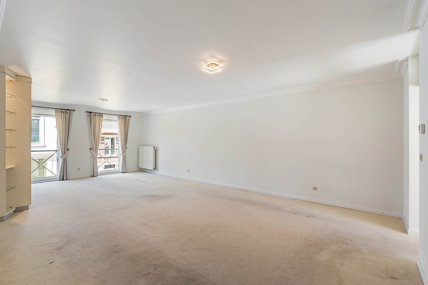 Ruim 3-slaapkamerappartement met groot terras en parkeergelegenheid aan de Grote Markt in Tienen - foto 4