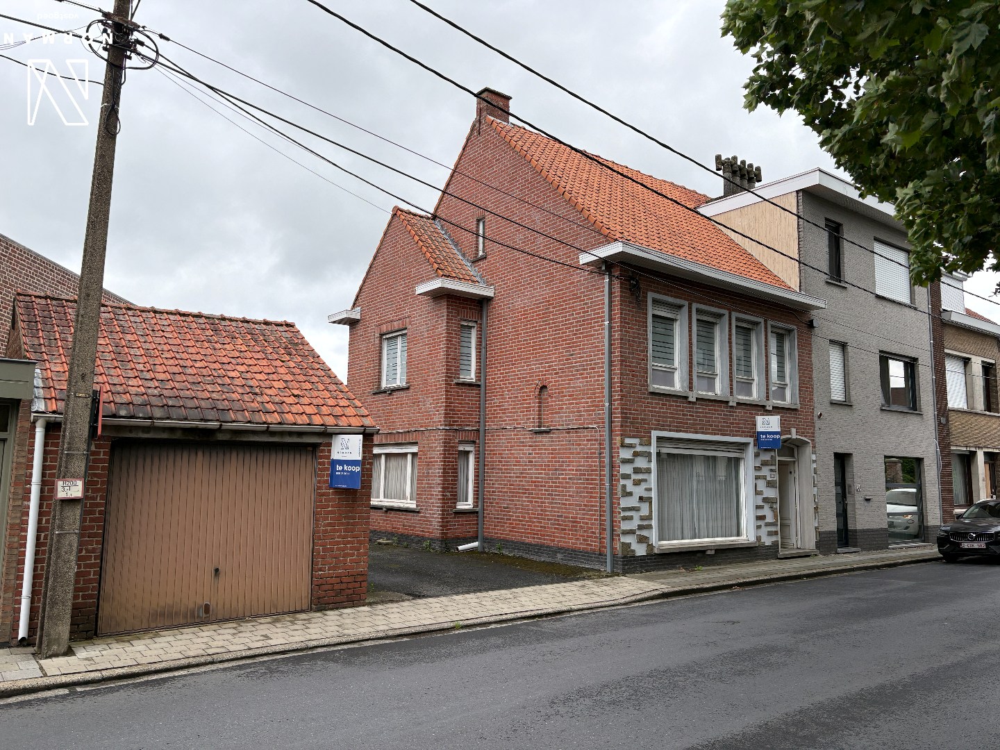 Karaktervolle woning met 4 slaapkamers en garage op perceel van 930 m² te koop met groot atelier en aanzienlijk stuk grond in centrum Hulste! - foto 3