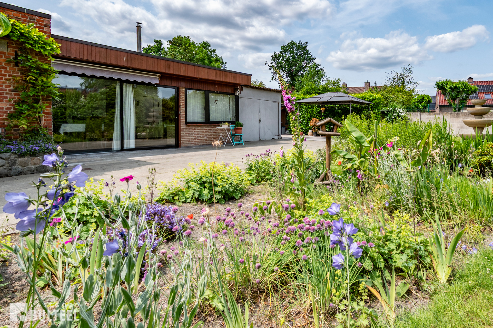 Karaktervolle woning met 5 slaapkamers op mooi perceel. - foto 4