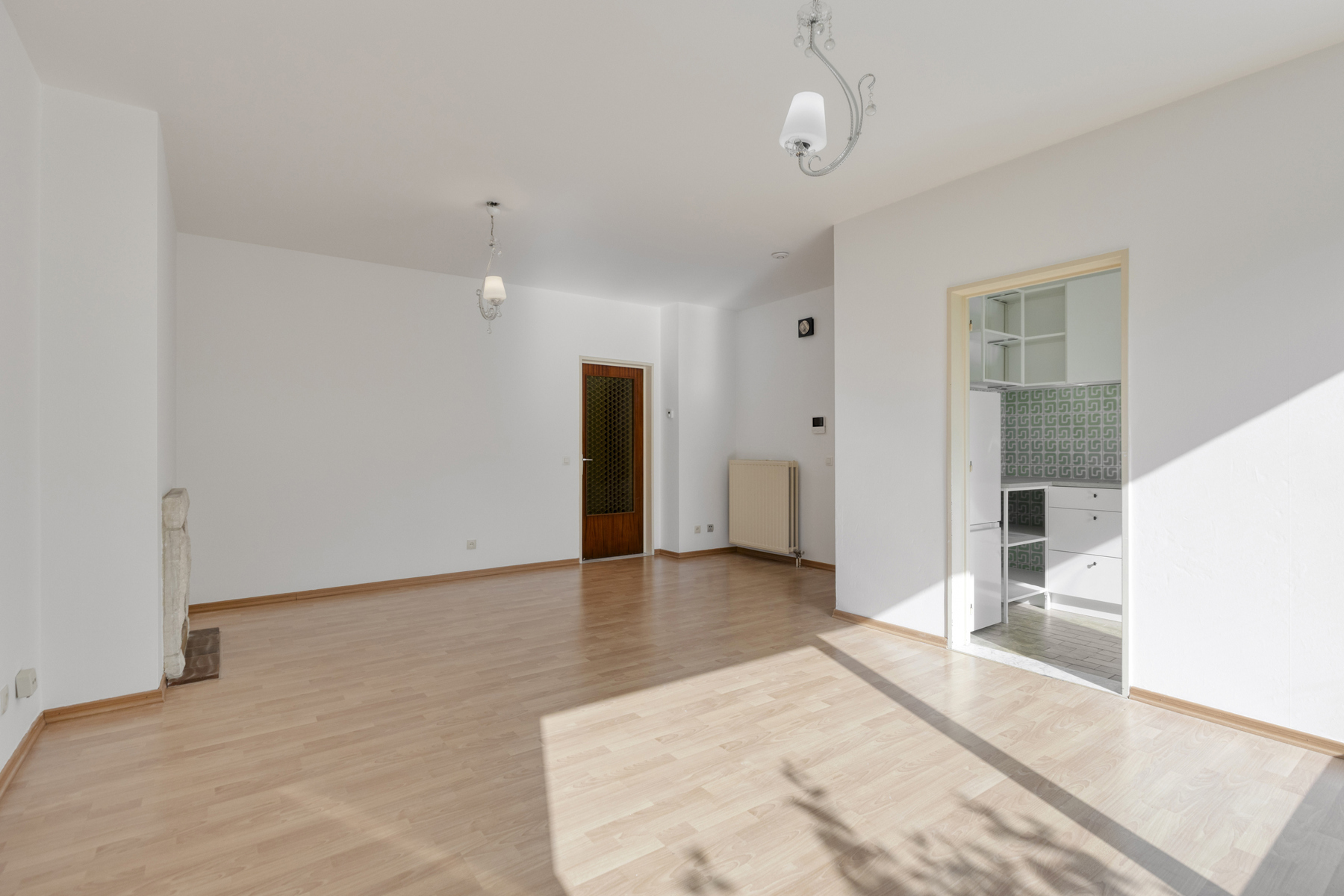 Gelijkvloers appartement met 2 slaapkamers, tuin en garage - foto 4
