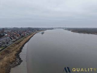 Ontdek de perfecte plek om te wonen in harmonie met de natuur! Dit prachtige perceel van 6.257 m² biedt een adembenemend uitzicht op de Schelde...