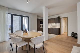 6% of VAT on the whole construction possible! UniQ combines the charm of the historic city center with the comfort of modern architecture. Located on the Hooikaai, this unique project offers 28 high-quality apartments.Why choose UniQ?- Centrally located: Surrounded by Brussels' cultural and culinary hotspots, with excellent public transport links and plenty of shops nearby.- Sustainable living: With excellent energy efficiency (A or B+ score), you can enjoy low energy costs and a green lifestyle.- Premium comfort: Each apartment is equipped with advanced insulation, contemporary finishes and thoughtful layouts that provide a sense of space and light.- Parking facilities: Spacious underground parking spaces and private cellars for your convenience.- Green environment: Relax in the communal garden and enjoy urban biodiversity.Compose your dream home with a wide range of options for finishes, floors and kitchen appliances. Enjoy large windows, modern balconies, and sweeping views of the city.Let the unique atmosphere of Brussels enrich your daily life and become part of a community that redefines modern living.Choose UniQ and discover what it means to live in a stylish, central and sustainable way. Contact our agents for a personal tour.UniQ: Your unique opportunity for exceptional living.