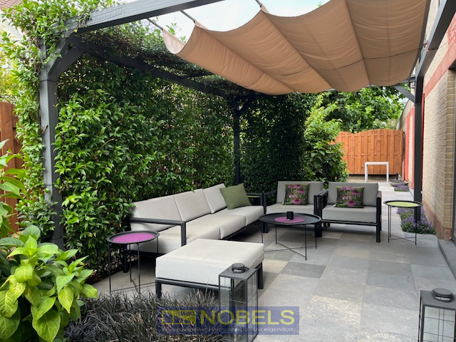 Te koop, instapklaar 2-slaapkamerappartement met tuin, terras en garage te Bevere (Oudenaarde). - foto 1