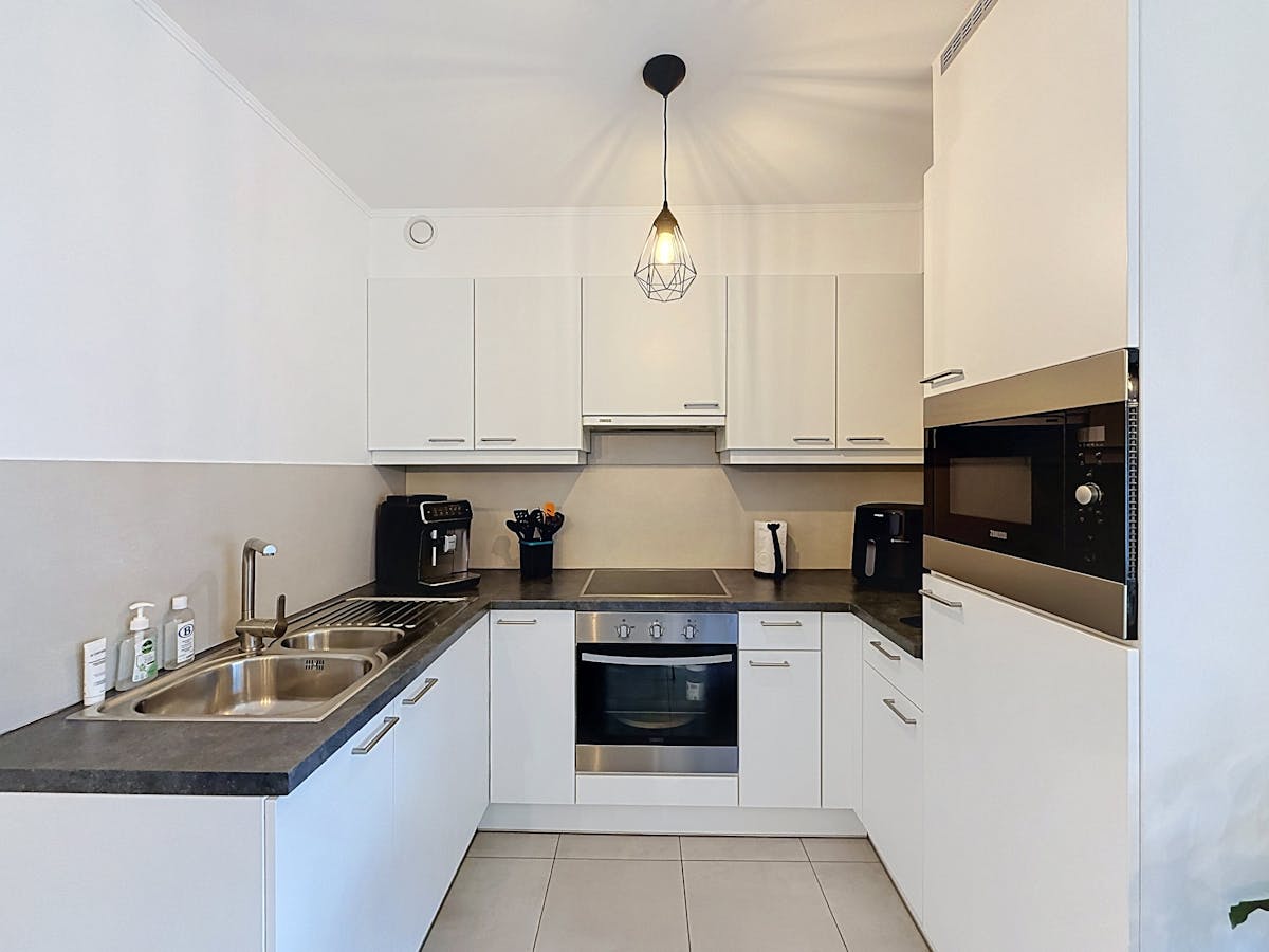 Modern appartement met terras te huur in Ieper - foto 5