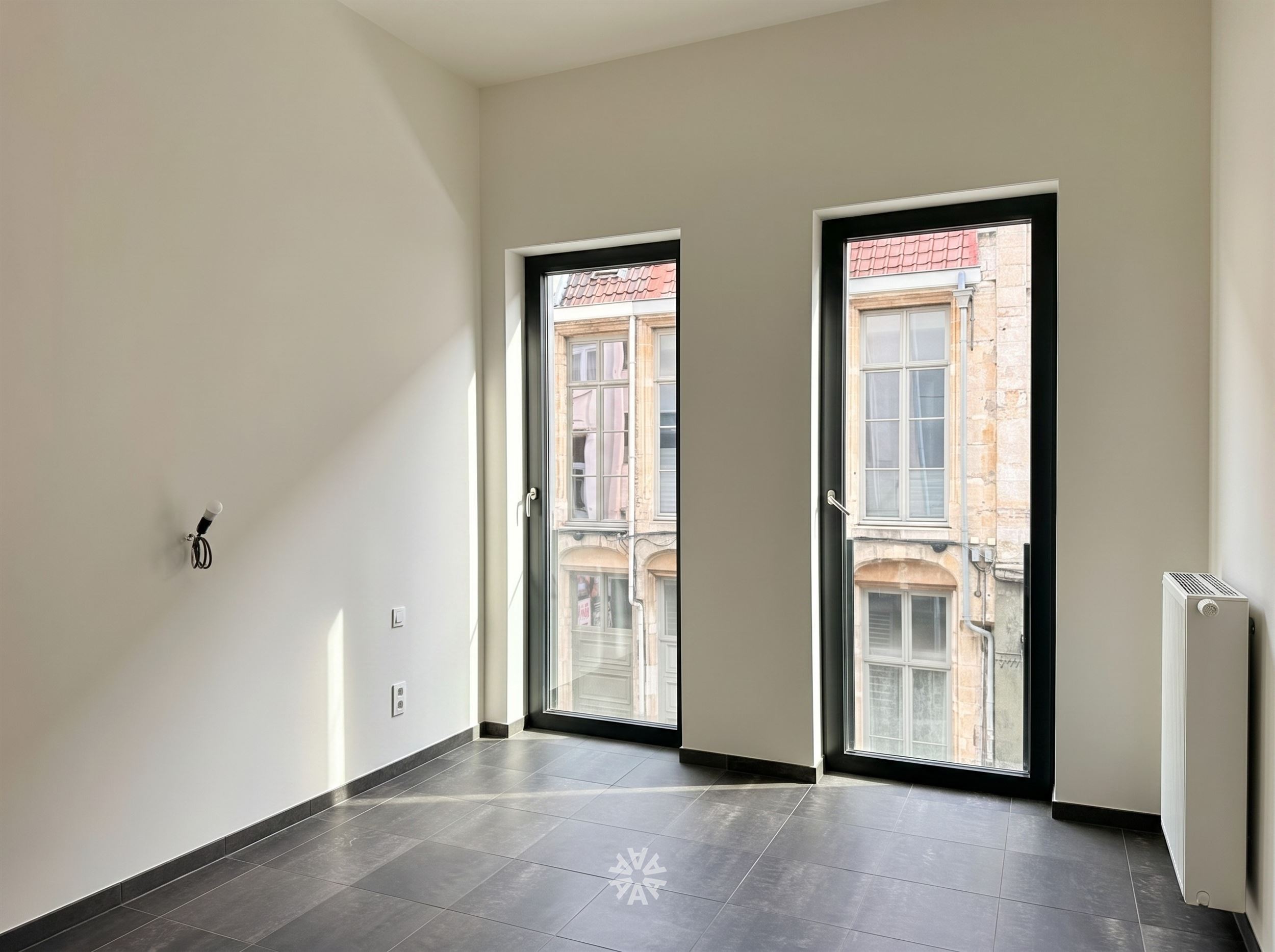 Lichtrijk twee slaapkamer appartement te huur in het hart van Gent - foto 5