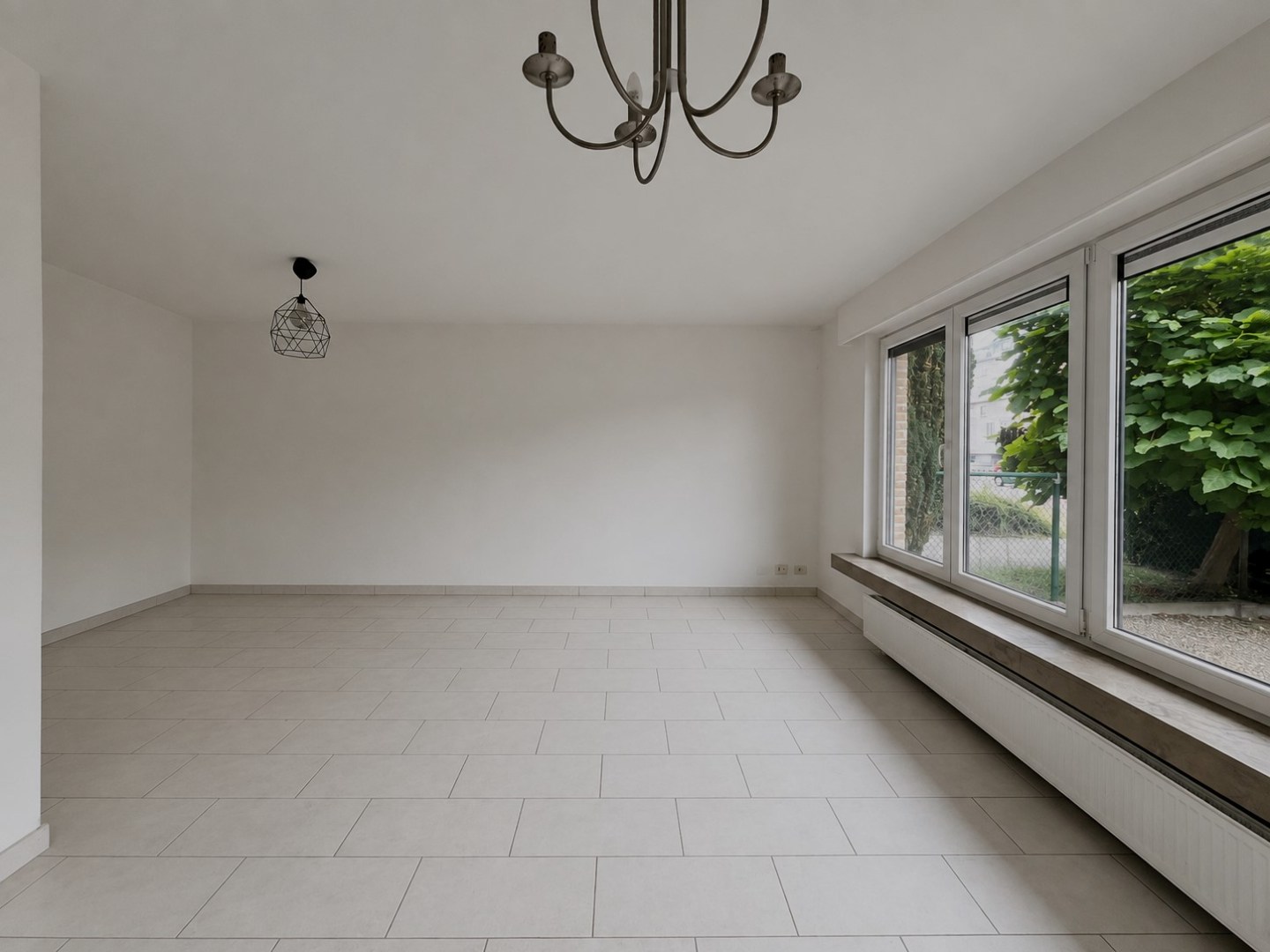 Hedendaags 2-slpk appartement met tuin, garage en kelder - foto 4