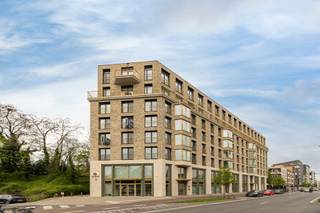 Modern 1-slaapkamerappartement met terrasGelegen op een toplocatie nabij winkels en voorzieningen aan de Plantin en Moretuslei, met vlotte...