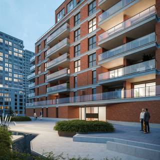 Laat je overspoelen door deze unieke omgeving. Hier woon je in alle rust, comfort en met een open zicht. Dit appartement gelegen op de eerste verdieping met 2 slaapkamers is afgewerkt met hoogwaardige materialen. Het gebouw omarmt de hedendaagse duurzaamheidsprincipes. Voor uw comfort is residentie Park 27 aangesloten op het stedelijke warmtenet. De teruggetrokken plaatsing van de grote raampartijen creëert meteen een structurele zonwering. Zonbeschermend glas en isolatie volgens de hoogste standaarden maken het af. De oranjerode baksteengevel brengt het voormalige industriële karakter van de haven weer tot leven, met een vleugje art deco. Er kan optioneel een parking en kelder in het gebouw aangekocht worden.