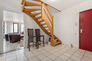 This spacious duplex apartment of 145 m² is located in a well-maintained building on the prestigious Britselei. Thanks to its residential location, you can enjoy a peaceful living environment in the middle of the city. The apartment has three bedrooms, a sunny terrace of over 20 m², and a private parking space on the ground floor.<br /><br />Situated on the prestigious Britselei, this apartment combines the best of both worlds: a central location within walking distance of shops, public transport, and restaurants, with a quiet, residential atmosphere. Additionally, it is located close to the vibrant Mechelsplein and the luxurious Botanic Sanctuary hotel. A neighborhood with real character!<br /><br />The duplex apartment is located on the fourth and fifth floors of a well-maintained building with a lift (built in 1994). With a living area of 145 m², this is an ideal home for those seeking comfort, space, and an outdoor feel in the city.<br /><br />The lift takes you directly to the entrance hall on the fourth floor. There, you enter a spacious hall that leads to the open living space, a fitted kitchen with creative accents, a guest toilet, a shower room, and an additional room currently used as a storage space. Upstairs, there are two full bedrooms — one of which is at the quiet rear side — a bathroom, a technical storage room, and a spacious terrace with views over the city. The use of parquet and natural stone provides a warm finish.<br /><br />The apartment is energy-efficient (EPC B - 167 kWh/m²), equipped with convenient built-in custom closets, and is located in a building with a lift. The parking space on the ground floor completes the picture.<br /><br />Advantages at a glance:<br />• 145 m² living area<br />• 3 bedrooms, flexible in layout<br />• Large sunny terrace of 20 m² with city views<br />• Kitchen with smart layout and creative accents<br />• Parquet and natural stone for a high-quality finish<br />• Energy-efficient: EPC label B (167 kWh/m²)<br />• Quiet, residential location in the city center<br />• Private parking space available for purchase for €15,000<br />• Well-maintained building with a lift (built in 1994)<br />• Within walking distance of Mechelsplein and Botanic Sanctuary<br /><br />This duplex apartment combines an excellent location with a smart layout, comfort, and a beautiful terrace. An ideal city home for those seeking space and tranquility in the heart of Antwerp.