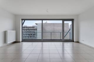 Cet appartement lumineux et économe en énergie de deux chambres bénéficie d'un emplacement exceptionnel, juste à côté de la gare de Bruges...