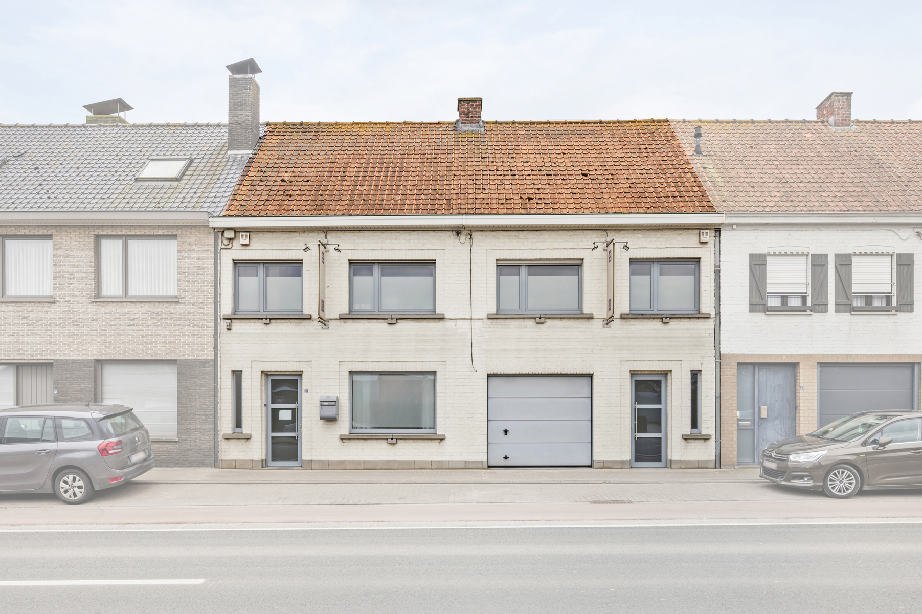 Dubbele woning met dubbele garage en tuin - foto 1