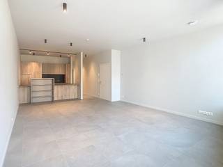 Dit prachtige nieuwbouwappartement met twee slaapkamers is gelegen op een absolute toplocatie, pal op de Grote Markt van Tienen!Dankzij deze centrale...