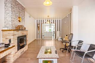 Deze woning biedt een bewoonbare oppervlakte van 136m² op een perceel van 73m² en beschikt over een centrale inkomhal, leefruimte, ingerichte...