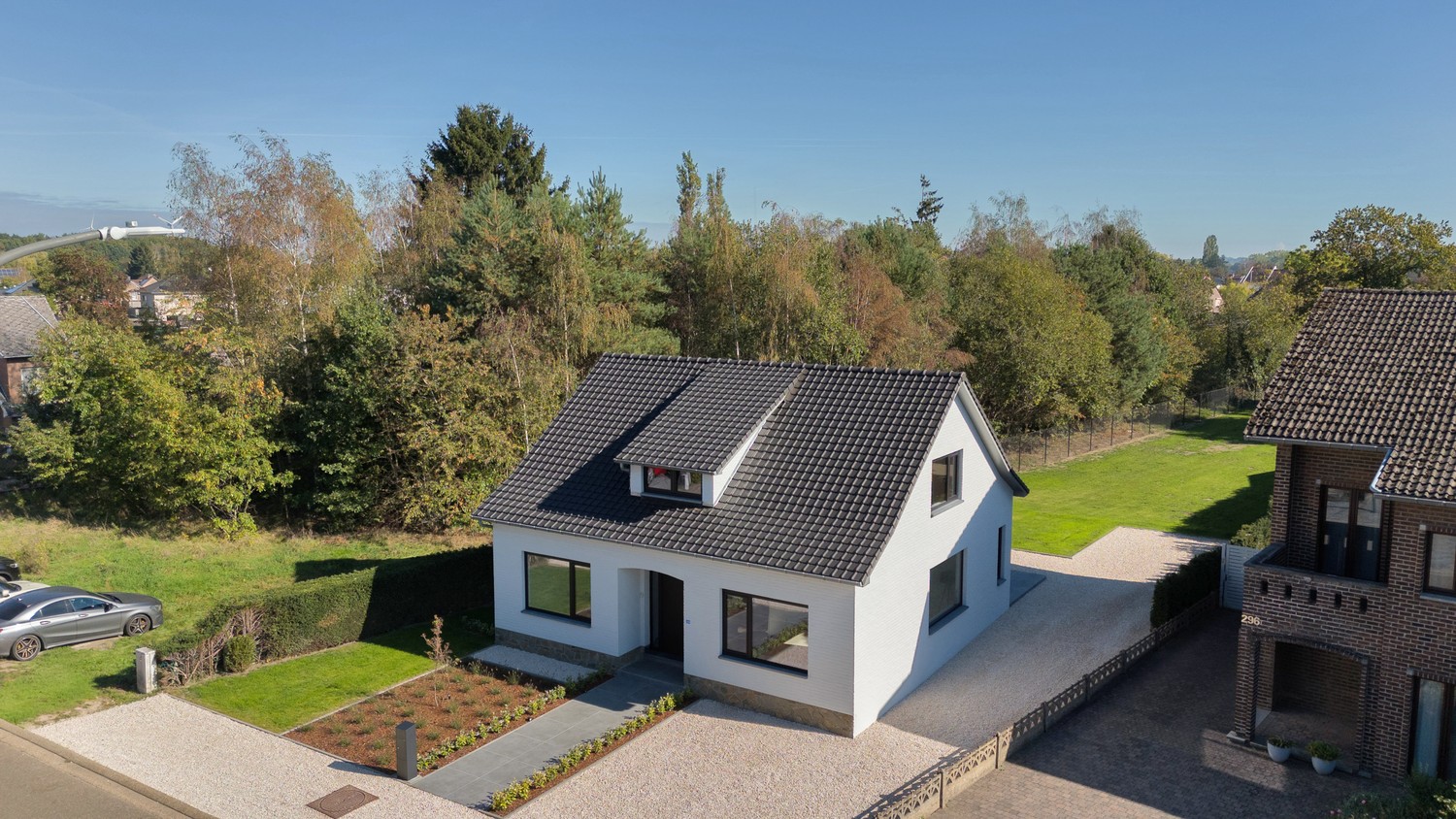 Stijlvol gerenoveerde woning met luxueuze afwerking en royale tuin in Rekem - foto 5